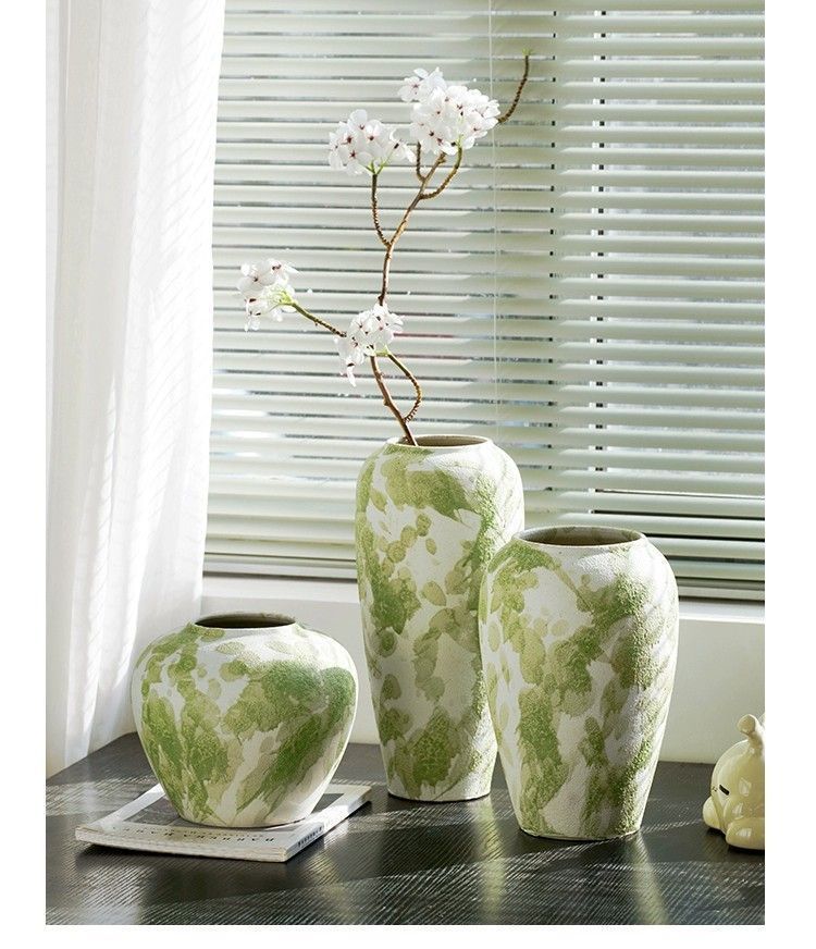 Unique and elegant green speckled ceramic vase